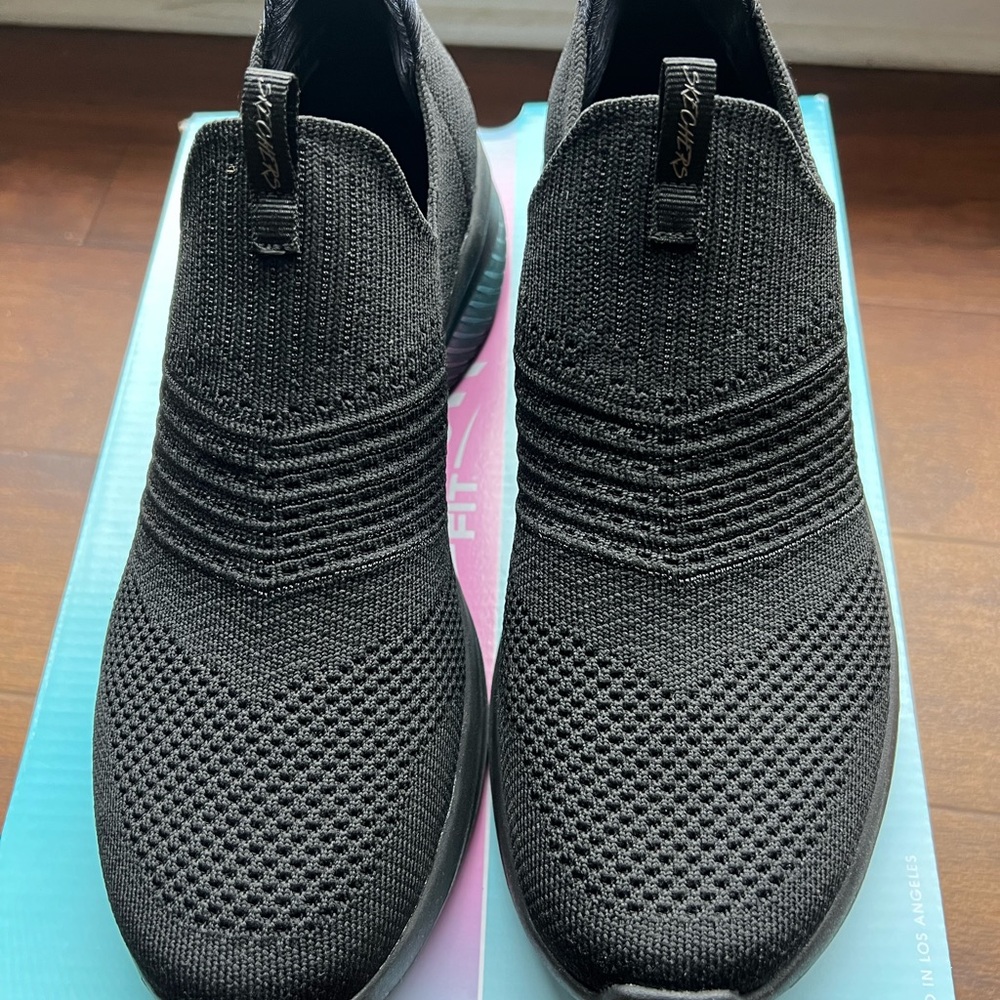Brand New
Skechers Black Knit Slip-On Sneakers